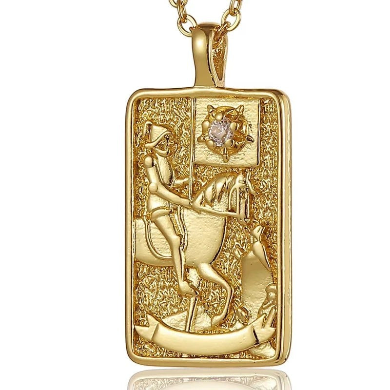 AuraTemple gold stainless steel necklace with a rectangular pendant featuring a tarot card design, cubic zirconia accent, and a horse rider motif.