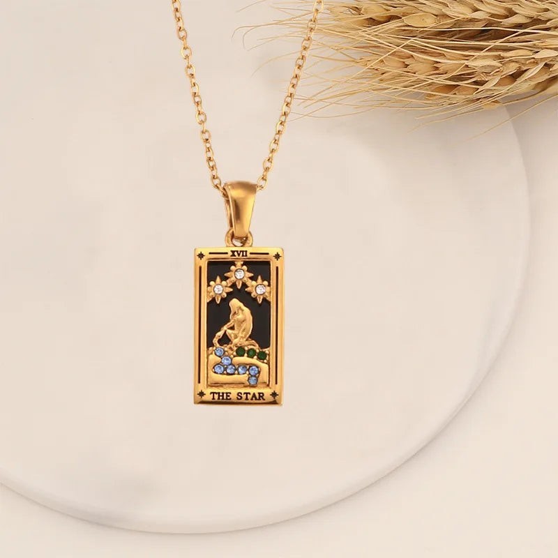 AuraTemple gold stainless steel necklace featuring a rectangular pendant with a Tarot card design, 'The Star', adorned with cubic zirconia.